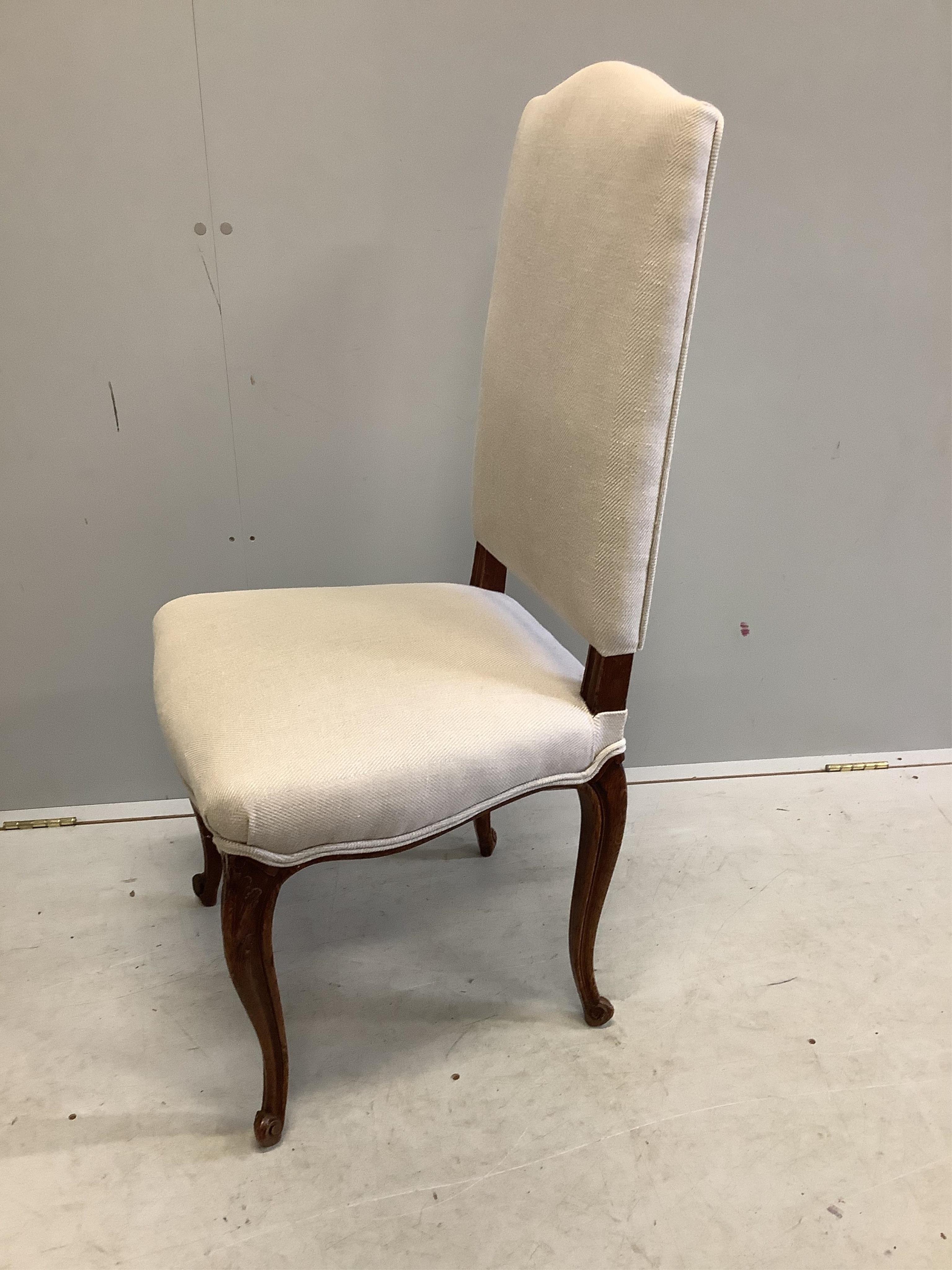 A set of eight 19th century French oak dining chairs, recently re-upholstered in a natural colour fabric, width 50cm, depth 46cm, height 106cm. Condition - good